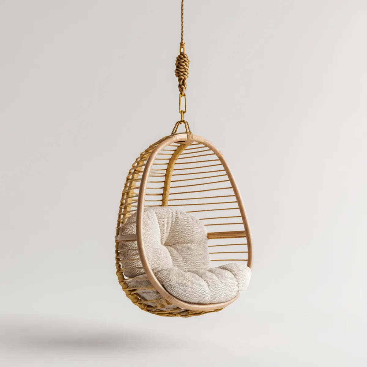 Hamak lub fotel wiszący, Naturalny owalny fotel wiszący i beżowy rattan z poduszką 80 x 70 x 120 cm